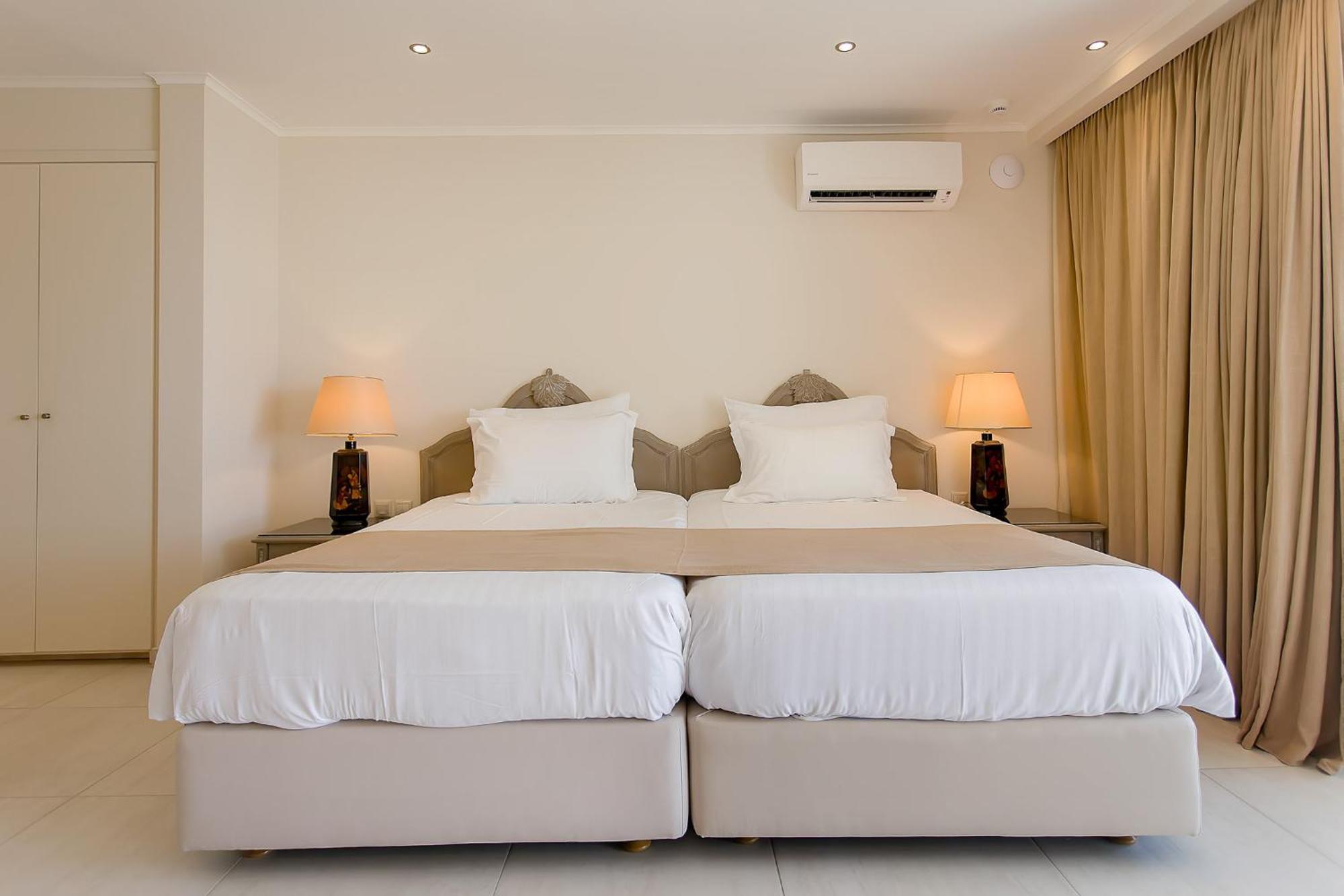 科孚宫酒店 帕拉马 外观 照片 A bedroom with two single beds